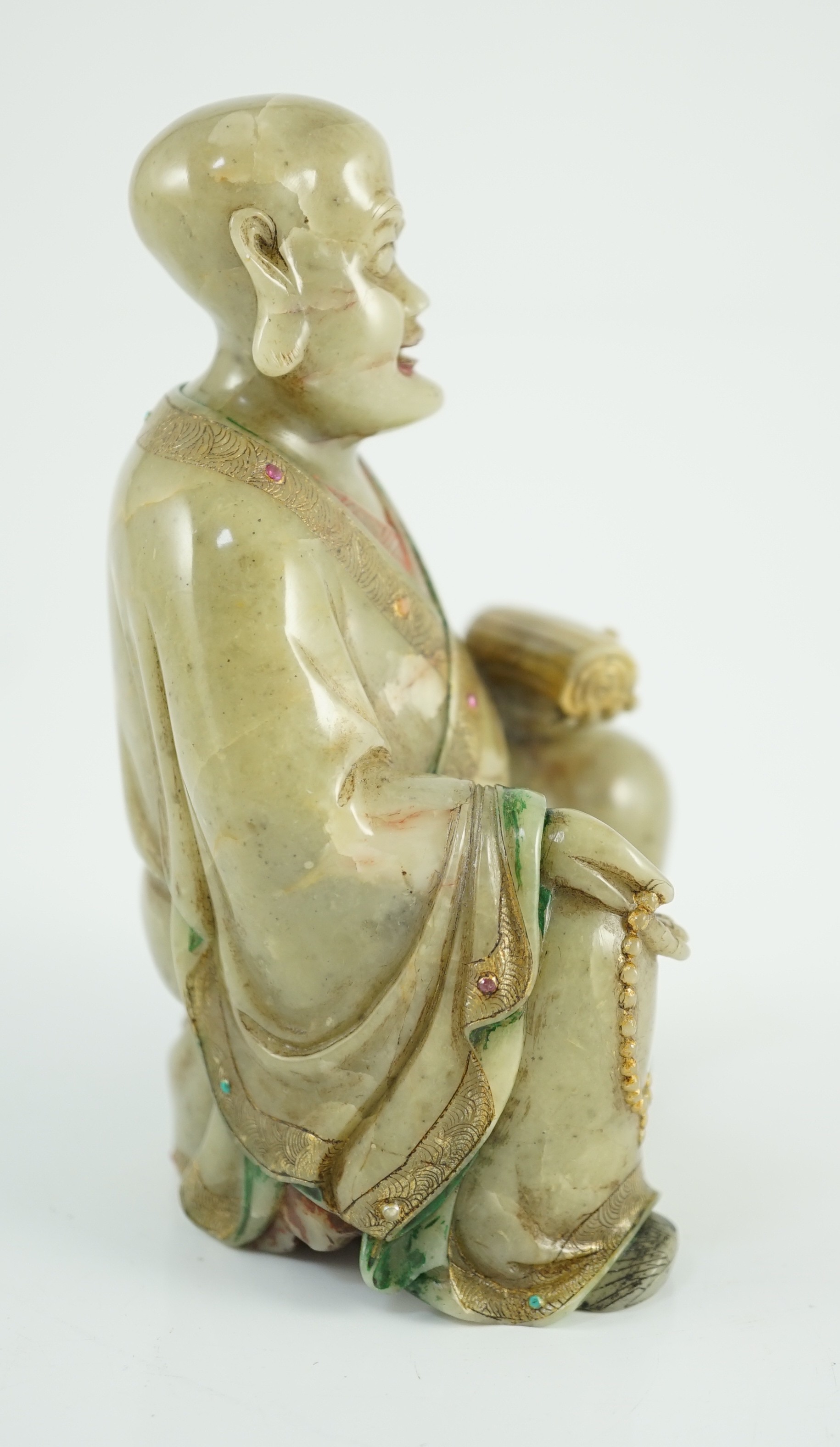 A Chinese soapstone seated figure of a luohan, 18th century, 12.5cm high